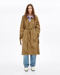 It is packed with lapel collar, long sleeves, side pockets and belt design. Camel Nylon Trench
