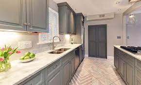 Traditional Kitchen With Gray Cabinets And White Calacatta Marble Countertops Grey Kitchen Cabinets Classic Kitchen Design Kitchen Cabinets