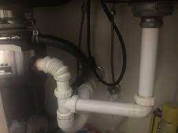 Photo about a plumber laying under a house hold sink working on a garbage disposal. Double Kitchen Sink Rt Side Without Garbage Disposal Never Drains Terry Love Plumbing Advice Remodel Diy Professional Forum