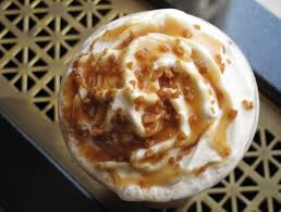 A traditional caramel ribbon crunch frappuccino is made with coffee, milk, ice, and caramel syrup, which are blended and topped with a layer of dark caramel sauce, whipped cream, caramel drizzle. Starbucks Caramel Ribbon Crunch Frappuccino Review Popsugar Food