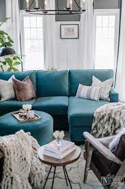 Our Eclectic Living Room Refresh With A Custom Velvet Chaise Sofa The Diy Mommy Teal Couch Living Room Teal Sofa Living Room Blue Sofas Living Room