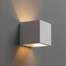 Due to its density, the thick layer of while plaster walls are smooth and flat, they contain slight surface trowel marks, adding a desirable old world feel to the character of a home. Wall Light White Square Gypsum Nevada