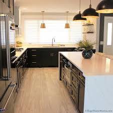 black white and gold kitchen remodel