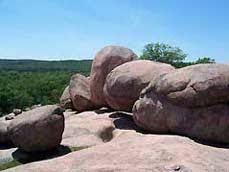 About 1.5 billion years ago, hot magma cooled forming coarsely crystalline red granite, which later weathered into huge, rounded boulders. Elephant Rocks State Park Missouri Vacations