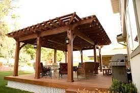 Pergolas customized with wrap around shades provide. Pergola Covered Deck Lattice Full Wrap Cantilever Roof Traditional Patio Salt Lake City By Western Timber Frame Houzz