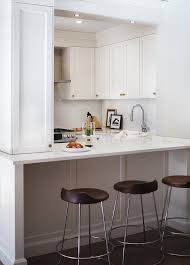Another idea for a small kitchen layout is to consider exposed cabinetry. Small Kitchen Peninsula Design Ideas
