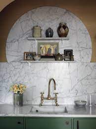 The black marble sink in this kitchen from domino really steals the show. Pin On Remodelista