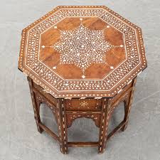 Pop by to enjoy our wide range of global imports. A Middle Eastern Occasional Table And Armchair 20th Century Bukowskis