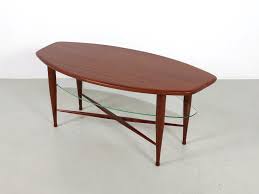 Midcentury teak coffee table with rattan shelf by kurt østervig, 1950s. Teak Coffee Table With Glass Magazine Shelf Kameleon Design