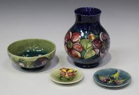 Check spelling or type a new query. A Moorcroft Pottery Clematis Pattern Vase Circa 1949 86 The Blue Ground Body Of Bulbous Shape Hei