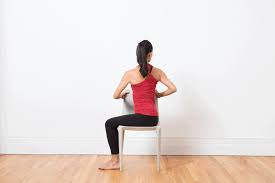 Spinal Twist In A Chair Chair Pose Yoga Yoga Poses Chair Yoga