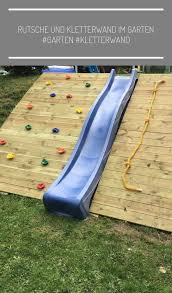 Rutsche Und Kletterwand Im Garten Garten Kletterwand Garten Kletterwand Rut Modern Design In 2020 Kids Playground Garden Wall Designs Vertical Garden Wall