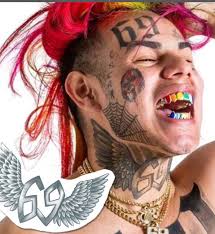 Pin By Nancy Griffith On Rapper Tekashi 6ix9ine Tattoo Dress Neck Tattoo Wing Neck Tattoo