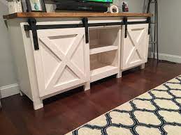 Vingli farmhouse tv stand with sliding barn doors for tvs up to 55 flat screen, rustic entertainment center media console table cabinet w/adjustable shelves (rustic brown) 4.6 out of 5 stars. Barn Door Hardware Console Build A Tv Stand Tv Stand Plans Rustic Tv Stand