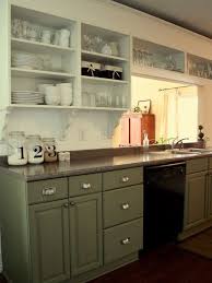 Give Your Kitchen A Fresh Look On A Budget Upper Kitchen Cabinets Green Kitchen Cabinets Kitchen Cabinet Design