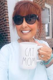 Cat mom and her feline companion