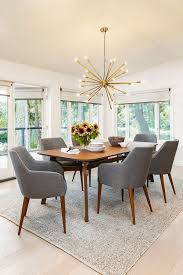 Eat Your Heart Out The Upholstered Feast Chair Features Slender Arms And Tapered Walnut Legs For Mid Century Dining Room Gray Dining Chairs Dining Room Chairs