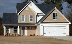 Black shutters and window flower boxes. Residential Garage Doors Newmarket Garage Doors