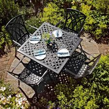 Tables, chairs and accessories to make your space an outdoor paradise. Lucy 4 Seater Garden Table Chairs Antique Bronze Lazy Susan
