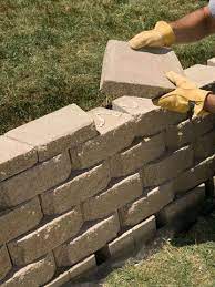 We 39 Ll Show You How To Build A Strong Stylish Retaining Wall Without Mortar Landscaping Retaining Walls Diy Retaining Wall Tiered Landscape