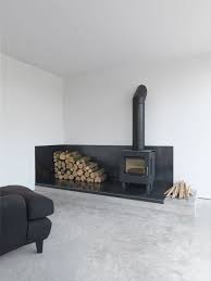 Anything seems possible by the light of a jøtul wood stove. Industrial Fire Space With Stove Feversham House By Mclaren Excell C Richard Leeney Home Fireplace Fireplace Design Scandinavian Fireplace
