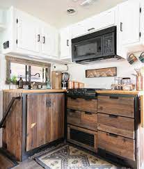 Wood kitchen cabinets are a favorite because they embody the rustic style, can be used to highlight the natural grain, and always look good with wooden flooring. Diy Reclaimed Wood Kitchen Cabinets Reclaimed Wood Kitchen Wood Kitchen Reclaimed Kitchen Cabinets