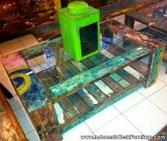 The top of the coffee table is built of salvaged wood from reclaimed shipping pallets milled into individual tongue. Bt2 4 Coffee Table Glass Top Reclaimed Boat Wood Furniture Bali
