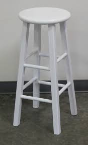 Interior Round White Wooden Stool With Long White Wooden Legs On The Gray Floor Captivating Wood Bar St White Wood Bar Stools Wood Bar Stools Wooden Bar Stools