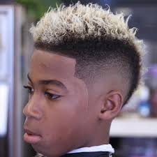 The contrast of the shaven sides and a messy look on the top is amazing. Mohawk Color Black Boys Haircuts Men S Haircuts Boys Haircuts Black Boys Haircuts Little Black Boy Haircuts