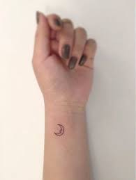 What does a tattoo of sun and moon symbolize? 37 Cute Mini Tattoos Of Moon And Stars For Women