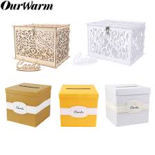 A wedding gift card box is displayed on the gift table at the reception. Home Garden Wooden Card Post Box With Lock Carved Flowers Gift Card Boxes Weddings Decors Card Boxes Wishing Wells
