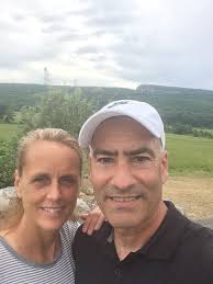 Husband, wife cherish roles in running community