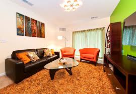 If your living room is feeling a little uninspiring and stale but doesn't necessarily warrant a full redesign, there are tons of easy ways to transform your space without spending a ton of time or money—and it can be as simple as moving. Youngmenheaven Brown White And Orange Living Room
