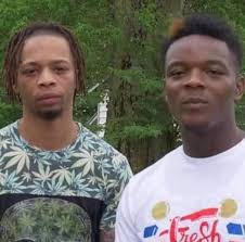 Proudly wearing a worn work shirt to son's game