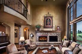 Beautiful Spanish Living Room Style With Rocks Fireplace Warm Furniture And Large Windows Spanish Style Bedroom Spanish Style Decor Spanish Style Homes
