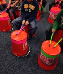 I Decided I Wanted To Change Things Up A Bit I Purchased 10 Home Depot Buckets Added Neon Tape And Then Put Th Teaching Music Preschool Music Music Education