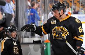 Brad marchand's late goal lifts canada to world cup of hockey title. Awwww I Feel Like Brad Marchand Is Good With Kids Boston Bruins Hockey Bruins Hockey Boston Bruins