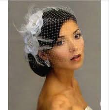 Keep reading for a peek at some of our favorite wedding hairstyles with veil ideas: Cheap Bird Cage Veil Fashion Bride Hats With Veil White Birdcage Veil Netting Face Short Feather Bridal Birdcage Veils Bridal Face Veil Bridal Veil Accessories
