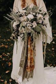 Bouquet for intimate pandemic elopement in missouri bohemian bouquet at modern and minimal wedding in san diego, california bohemian bouquet with anthurium and roses Pin By Forever Soles On Weddings Boho Wedding Bouquet Bohemian Wedding Bouquet Boho Wedding Flowers
