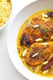 Add green peppercorns and reserved chicken. Moroccan Tagine With Saffron Couscous Tagine Recipes Tajin Recipes Moroccan Food
