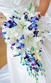 Cascading Bridal Bouquet White Oriental Lillies And Blue Dendrobium Orchids Blue Wedding Bouquet Tropical Wedding Bouquets Blue Wedding Flowers