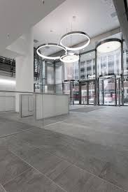 For Its New Headquarters The Sparkasse Bank In Hannover Has Chosen The Stoneline Collection The Stone Effect Surfa Interior Decorating Interior Design Design