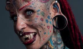 Here is a compilation video scarification done all over the world! 10 Crazy Body Modifications Tattoo Com