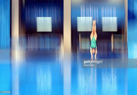 Michelle Staudenherz Of Austria Perfoms A Back Dive Pike In The Diving Springboard Diving Sport Photography