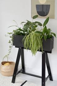 Create This Lovely Plant Box Using An Inexpensive Ikea Desk Piece Hunker Ikea Hack Ikea Plants Diy Ikea Hacks