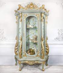 Wooden cabinets confer an elegant touch to the living room and hallways. Sold Rococo Baroque Curio Cabinet Eclat Designs By Crystin
