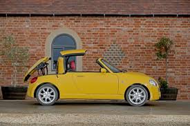 Image result for Medium Yellow 1966 Daihatsu