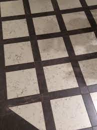 Before you begin, make sure the tiles work by laying lay the tiles with the first tile centered in the middle of the floor, and work outward from that. Lovely Grid Marble Floor Floor Tile Design Flooring Marble Floor