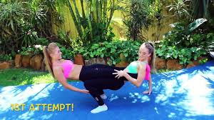 From a seated position facing each other, extend legs out exhale as one person folds forward from the hips and the other sits back, keeping the spine and arms straight. Extreme Yoga Challenge Teagan Sam Video Dailymotion