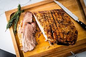 Simply rub the meat with the only disadvantage to making a boneless roast is that once it's done, you don't have bones to boneless pork shoulder: Roast Pork Shoulder With Garlic And Herb Crust